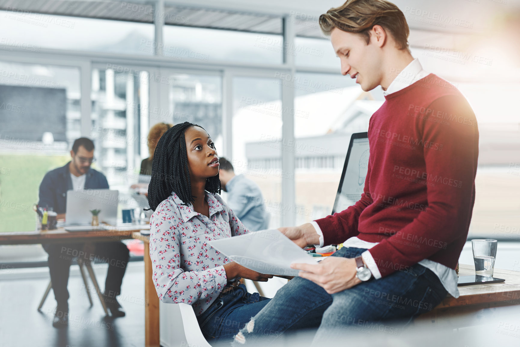 Buy stock photo Paperwork, discussion and colleagues in office, diversity and ui designer with woman for project and explaining. Teamwork, coworking and man with documents, planning or creative together for proposal