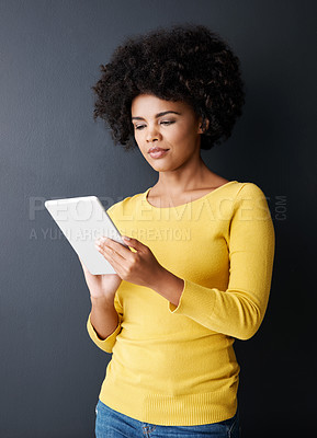 Buy stock photo Black woman, reading and tablet with social media, app or chat with internet communication. Streaming, online and person with tech for watching a video, post or research with web connectivity