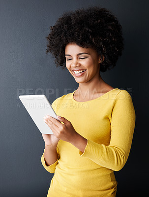 Buy stock photo Happy, black woman and tablet with social media, app or chat with internet communication. Reading, online and person with tech to watch a video, post or typing with happiness, smile or connection