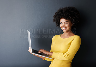 Buy stock photo Online class, work and portrait of black woman with laptop, mockup and happiness in studio background. Computer, research and college student typing on keyboard for working, project or e learning