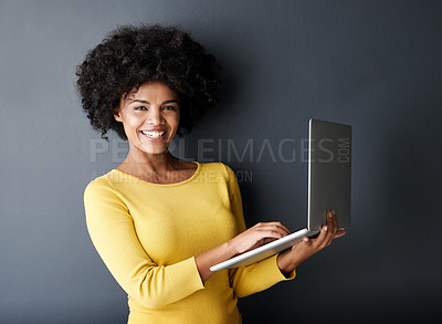 Buy stock photo E learning, work and portrait of black woman with laptop, mockup and happiness in studio background. Computer, research and college student typing on keyboard for working, project or online class