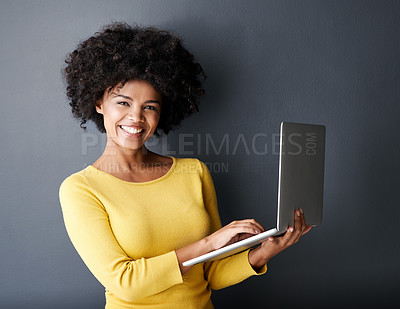 Buy stock photo Study, e learning and portrait of black woman with laptop, mockup and happiness in studio background. Computer, research and college student typing on keyboard for online class, project or education