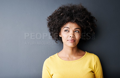Buy stock photo Thinking, black woman and face with ideas in studio and gray background with inspiration or info. African, person and college student planning a creative solution or problem solving in mockup space