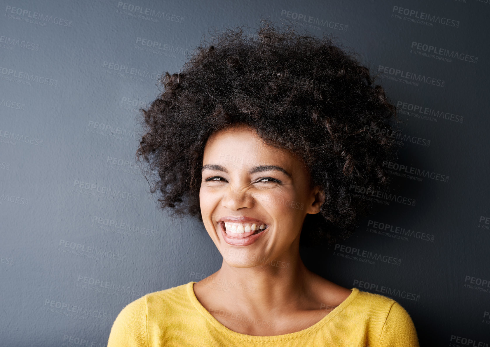 Buy stock photo Black woman, laugh and beauty portrait in studio with happiness, freedom or wellness in mockup space, Happy, face and natural African hair care, cosmetics and smile for dermatology on grey background