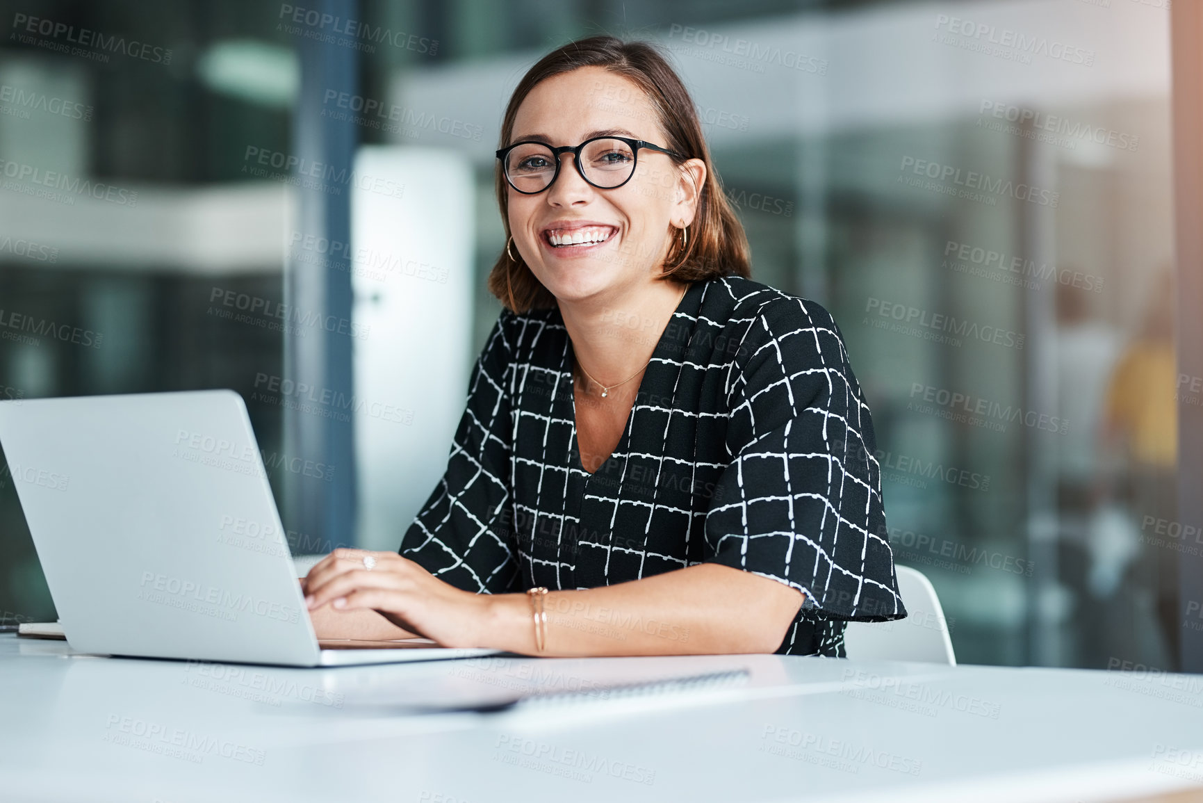 Buy stock photo Portrait, woman and typing in office with laptop for work as receptionist, administrative support and professional. Female employee, happy and email to confirm schedule and appointment planning.