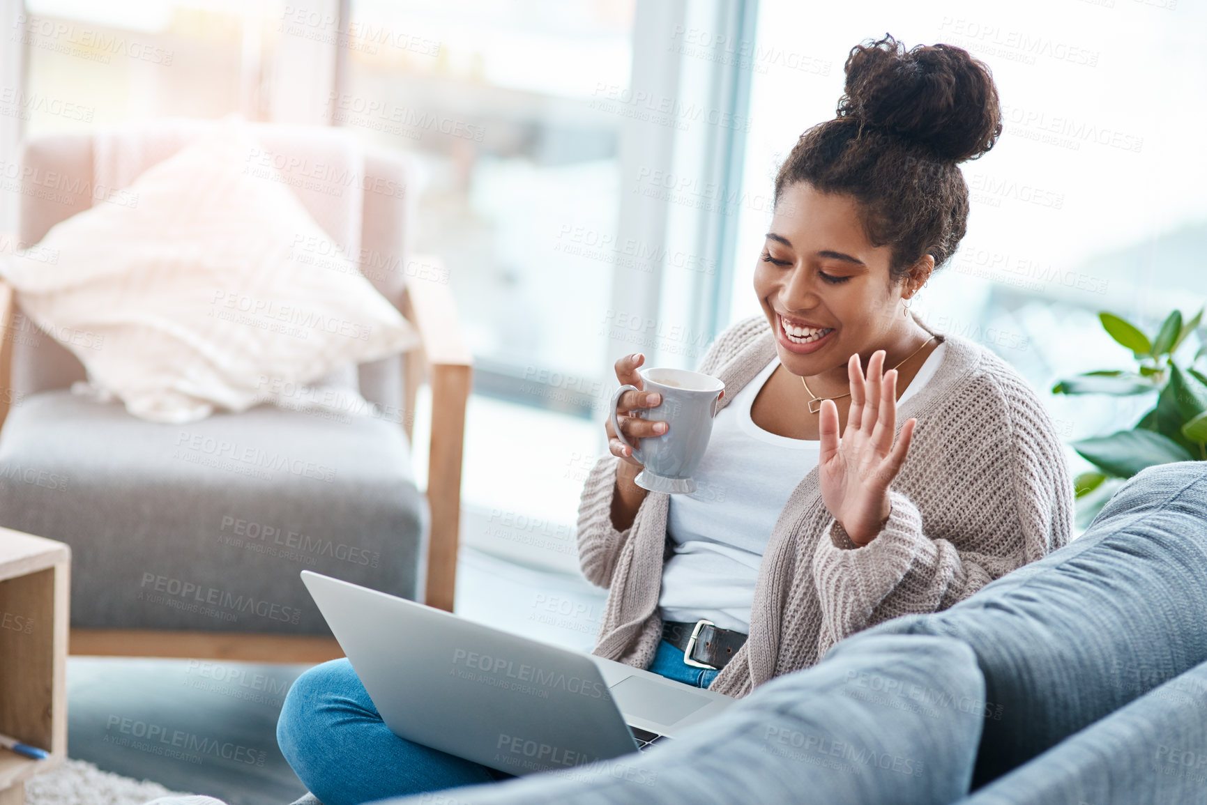Buy stock photo Happy woman, laptop and video call on home sofa with a smile and hand to wave hello. Real female person relax on a couch with coffee, internet connection and tech to talk online for communication
