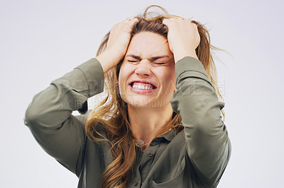 Buy stock photo Woman, frustrated and pulling hair in studio for burnout, stress and mental health. Model, angry and headache for bad news, depression and partner cheating on isolated white background with anxiety