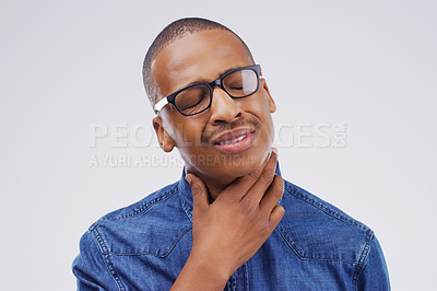 Buy stock photo Black man, sore throat and virus from cough, allergies or bacteria against a white studio background. Sick African male person touching neck in pain, allergy or flu of cold, illness or infection