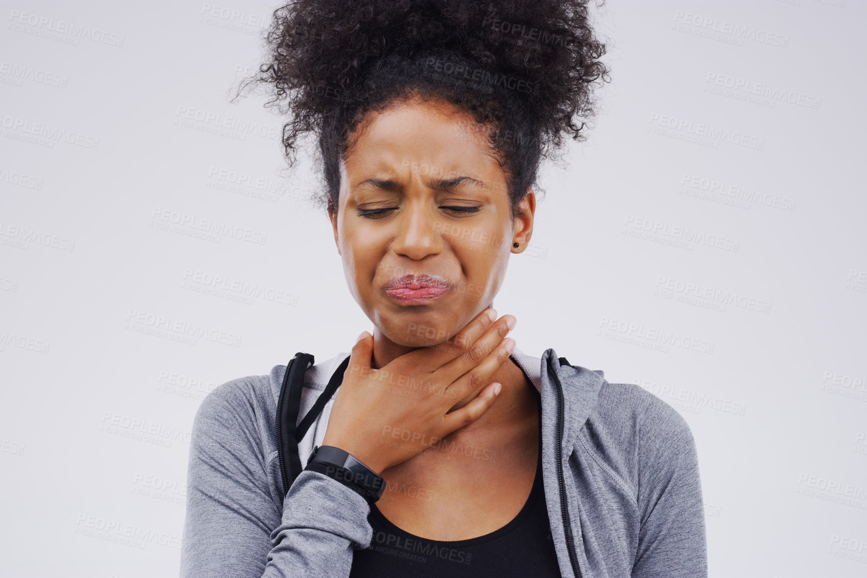 Buy stock photo Black woman, sore throat and virus from cough, allergies or bacteria against a white studio background. Sick African female person touching neck in pain, allergy or flu of cold, illness or infection