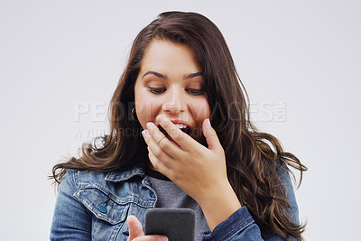 Buy stock photo Woman, surprise and phone in shock for winning, prize or good news against a white studio background. Shocked or surprised female person reading on mobile smartphone in wow for lottery competition