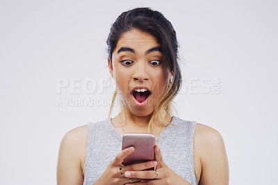 Buy stock photo Woman, emoji and cellphone in studio for surprise, wow and contact and social media for networking. Gen z, female student and influencer with shock for discount, meme and online sale by backdrop