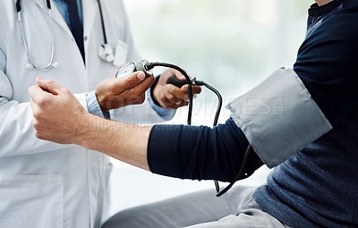 Buy stock photo Man, hands or doctor with pump for blood pressure, checkup or hypertension exam at hospital. Closeup, male person or medical cardiologist with tool or equipment for artery or cardiac result at clinic