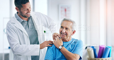 Buy stock photo Senior man, shoulder and physiotherapy doctor with check, inspection and care for injury in retirement at clinic. Happy medic, physio and men together for rehabilitation, recovery and help for health