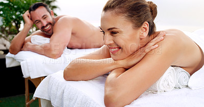 Buy stock photo Spa, relax and happy couple outdoor for massage, vacation and resting on a table with zen. Love, peace and man with woman at a luxury resort for wellness, treatment and body therapy, smile or bonding