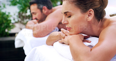Buy stock photo Relax, spa and couple on a massage bed with peace, calm and luxury outdoor on a zen balcony. Love, romance and woman with man at a beauty salon or resort for vacation, holiday and relaxation in Bali