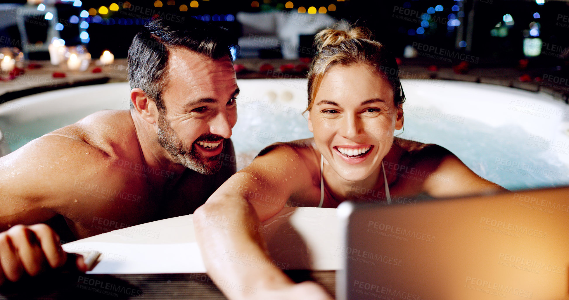 Buy stock photo Tablet, selfie and couple in hot tub at spa for holiday, romantic vacation and weekend getaway. Water, marriage and man and woman take picture for social media on honeymoon, anniversary and relax