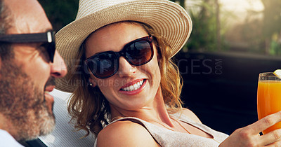 Buy stock photo Cocktail, relax and couple on hotel terrace with smile, sunglasses and tropical holiday fun together. Blanket, man and happy woman on outdoor couch with wine, cozy romance and date on travel vacation