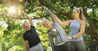 Buy stock photo Yoga, fitness and an old couple with their coach in a park for a health or active lifestyle. Exercise, wellness or zen and senior people training outdoor for a workout with their personal trainer