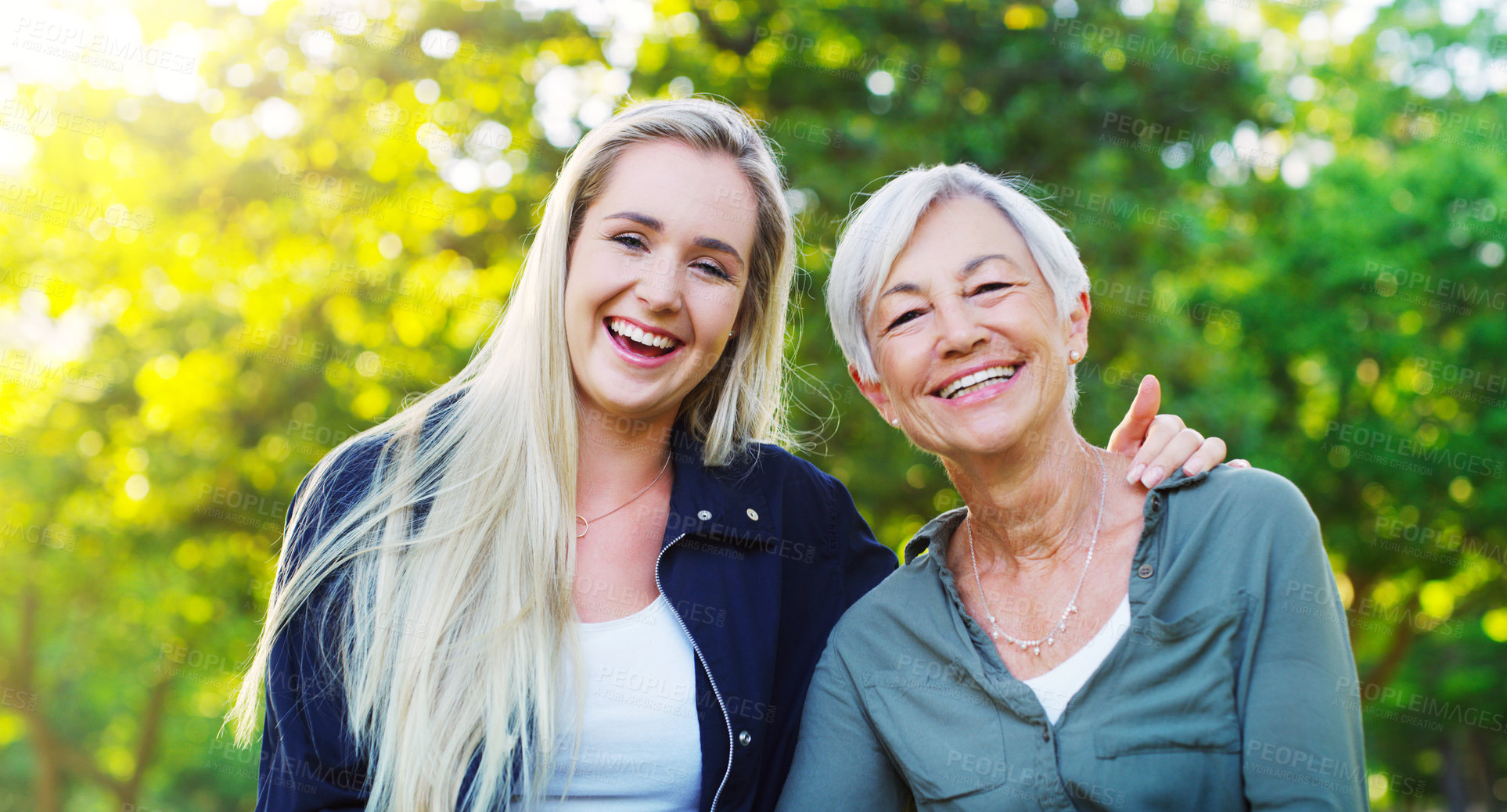 Buy stock photo Portrait, senior woman and adult daughter in park, happy outdoor with hug, laughter and spending quality time together. Love, trust and relationship, people in nature and good humor while bonding