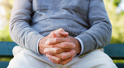 Buy stock photo Outdoor, park and hands of senior person together for hope, worship or praying by trees in environment for summer. Spiritual, old people or relax for calm in garden, nature or gratitude in retirement