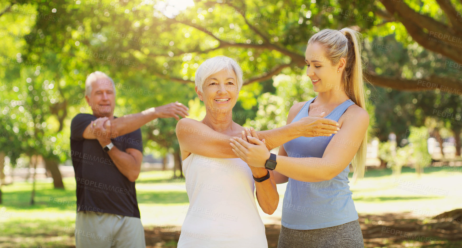 Buy stock photo Yoga, exercise and an old couple with their personal trainer in a park for a health or active lifestyle. Fitness, wellness or zen and senior people outdoor for a workout with their pilates coach