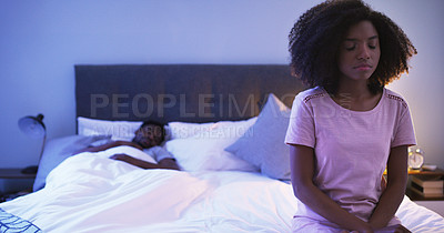 Buy stock photo Bedroom, black couple and woman sad at night while thinking of divorce, stress or depression. A man sleeping in home bed with partner upset about fight, marriage problem and cheating or infertility