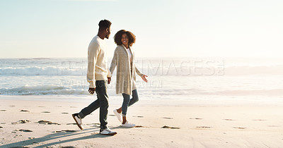 Buy stock photo Sand, love and black couple at beach with walking for travel, tropical vacation and adventure together. Man, woman and journey at ocean with smile for support, anniversary and holiday in Mauritius