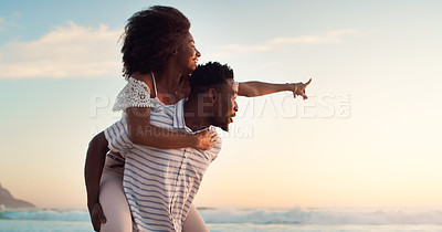 Buy stock photo Black couple, piggyback and holiday at beach for travel, adventure and happiness. Love, explore and man carrying woman in nature for sunset, point and date in tropical paradise for summer vacation