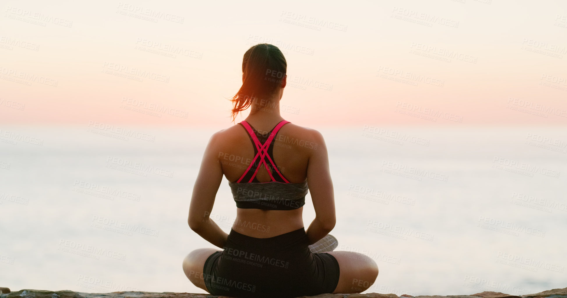Buy stock photo Rear view, woman and meditation for yoga on beach or wellness, zen and relax for exercise or workout. Young lady, sunset and sea for peace environment, mindfulness or breathing, travel and health 