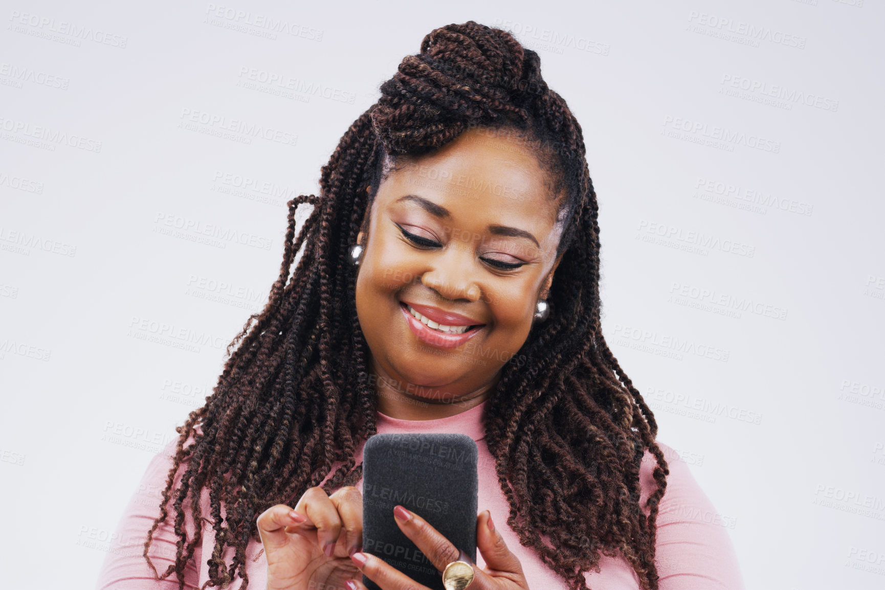 Buy stock photo Phone, happy and face of black woman in studio with smile for social media, internet and online chat. Communication, white background and female person on smartphone for website, mobile app and text