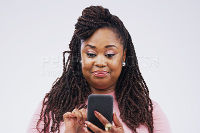 Buy stock photo Communication, online and face of black woman with phone in studio for social media, internet and chat. Mockup, white background and female person on smartphone for website, mobile app and texting