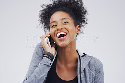 Buy stock photo Phone call, funny and black woman speaking in studio isolated on a white background with mockup. Cellphone, laughing and African female person in communication, happy conversation and comic comedy.