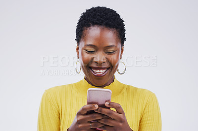 Buy stock photo Social media, black woman on smartphone and smile against a white background. Connectivity or technology, communication or texting and African female person happy with cellphone in a studio backdrop