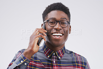 Buy stock photo Phone call, happy and portrait of black man in studio for conversation, talking and funny chat. Communication mockup, white background and male person on smartphone for network, contact or connection