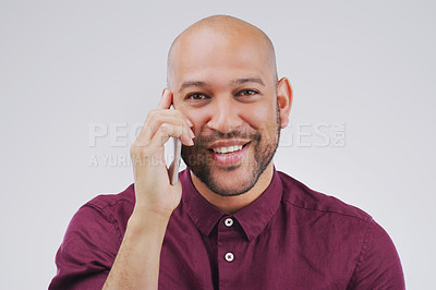Buy stock photo Phone call, communication and portrait of man in studio for conversation, talking and chatting. Mockup, white background and face of male person on smartphone for networking, contact and connection