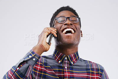 Buy stock photo Phone call, laugh and happy black man in studio for conversation, talking and funny chat. Communication mockup, white background and male person on smartphone for network, contact and connection