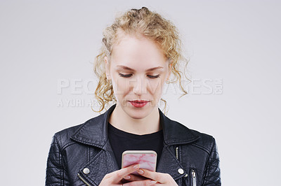 Buy stock photo Contact, mockup and woman with a smartphone, typing and communication against a white studio background. Female person, model and girl with a cellphone, connection and search internet for information