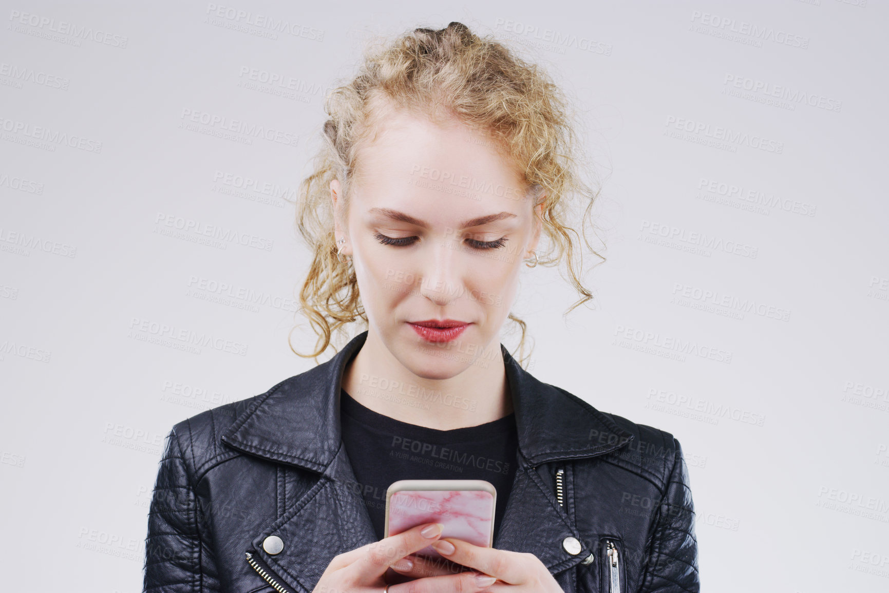 Buy stock photo Contact, mockup and woman with a smartphone, typing and communication against a white studio background. Female person, model and girl with a cellphone, connection and search internet for information