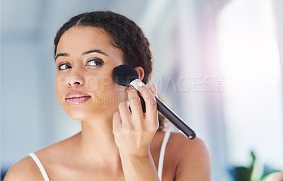Buy stock photo Glamour, makeup and woman with a cosmetic brush for a natural, skin and face in her bathroom. Young, beauty and beautiful female person with cosmetics powder for a morning routine in her apartment.