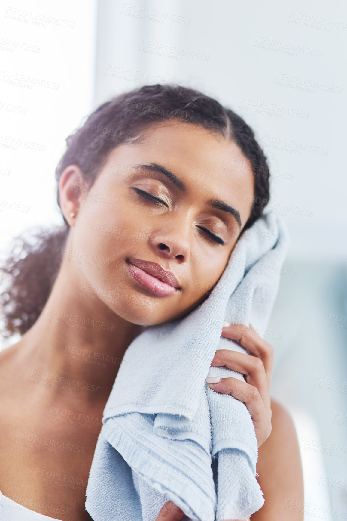 Buy stock photo Skincare, towel and black woman wipe face in bathroom for hygiene, clean or morning routine. Fresh, wellness and female person with cloth for dry skin, grooming treatment or eyes closed in home