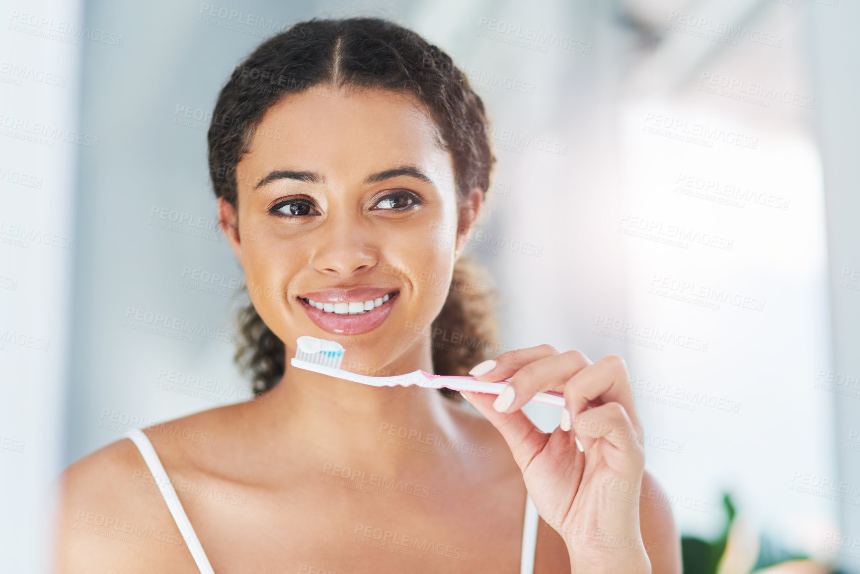 Buy stock photo Morning, bathroom and woman with toothbrush in home for dental hygiene, wellness or oral care with product. Cleaning, brush and girl with toothpaste for fresh breath, teeth whitening and pride