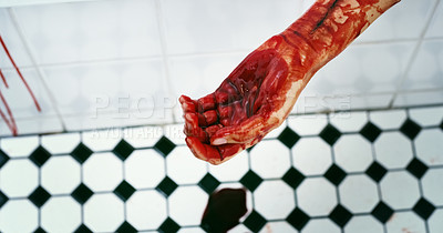Buy stock photo Cropped shot of an unrecognizable hand dripping blood on a crime scene