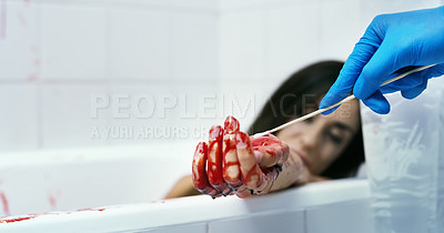 Buy stock photo Cropped shot of an unrecognizable official inspecting a dead body on a crime scene