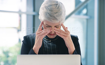 Buy stock photo Mature, businesswoman and laptop or stress headache in office as teach ceo with pressure, sinus or pain. Female person, hands and migraine inflammation for corporate anxiety, burnout or overworked