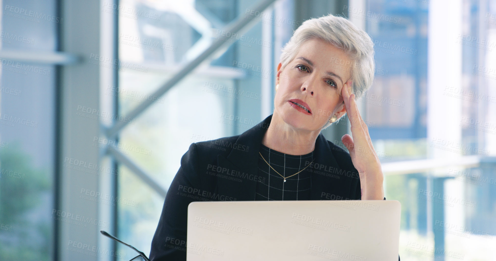 Buy stock photo Mature, businesswoman and portrait at laptop with headache as teach ceo or pressure, vertigo or pain. Female person, stress and migraine inflammation with corporate brain fog, burnout or overworked