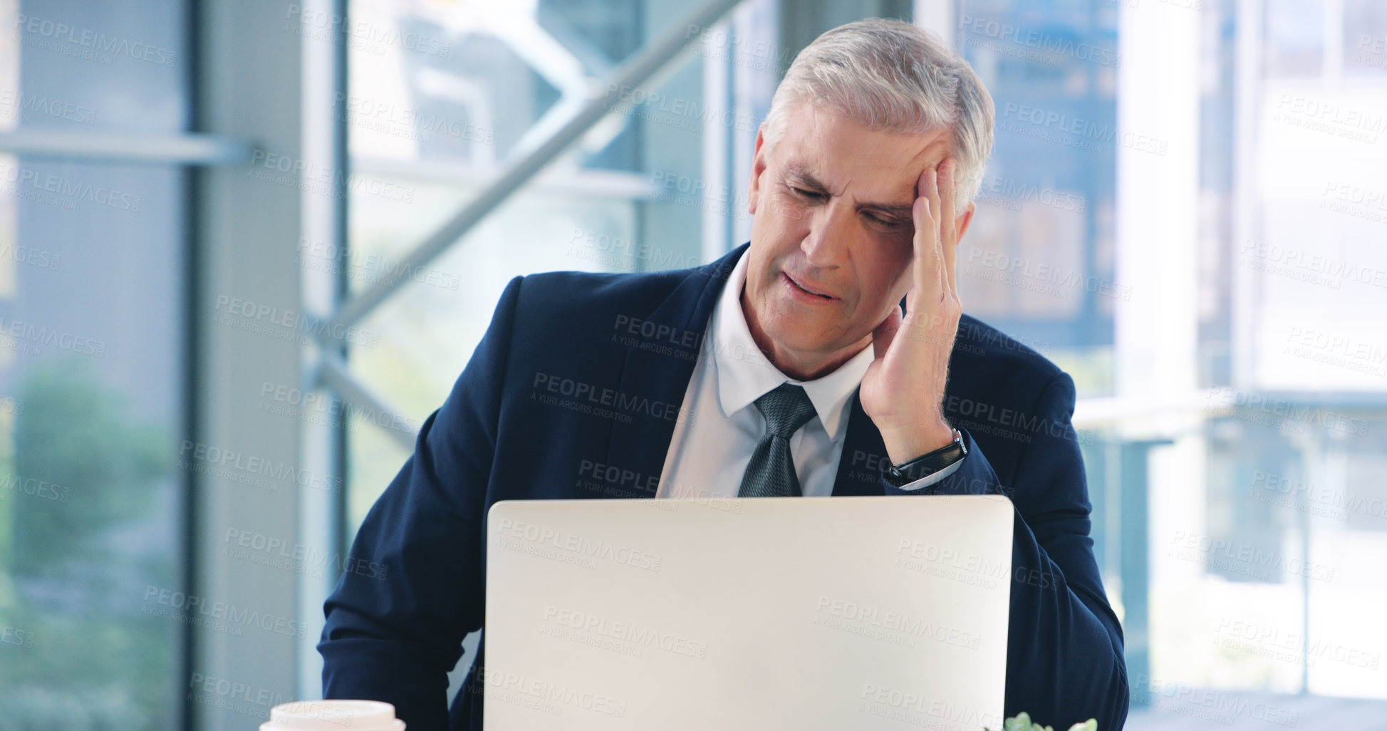 Buy stock photo Mature, businessman and headache pain at laptop as finance executive, corporate or bankrupt. Male person, hand and burnout stress with brain fog in office or tax frustration,  anxiety or accounting