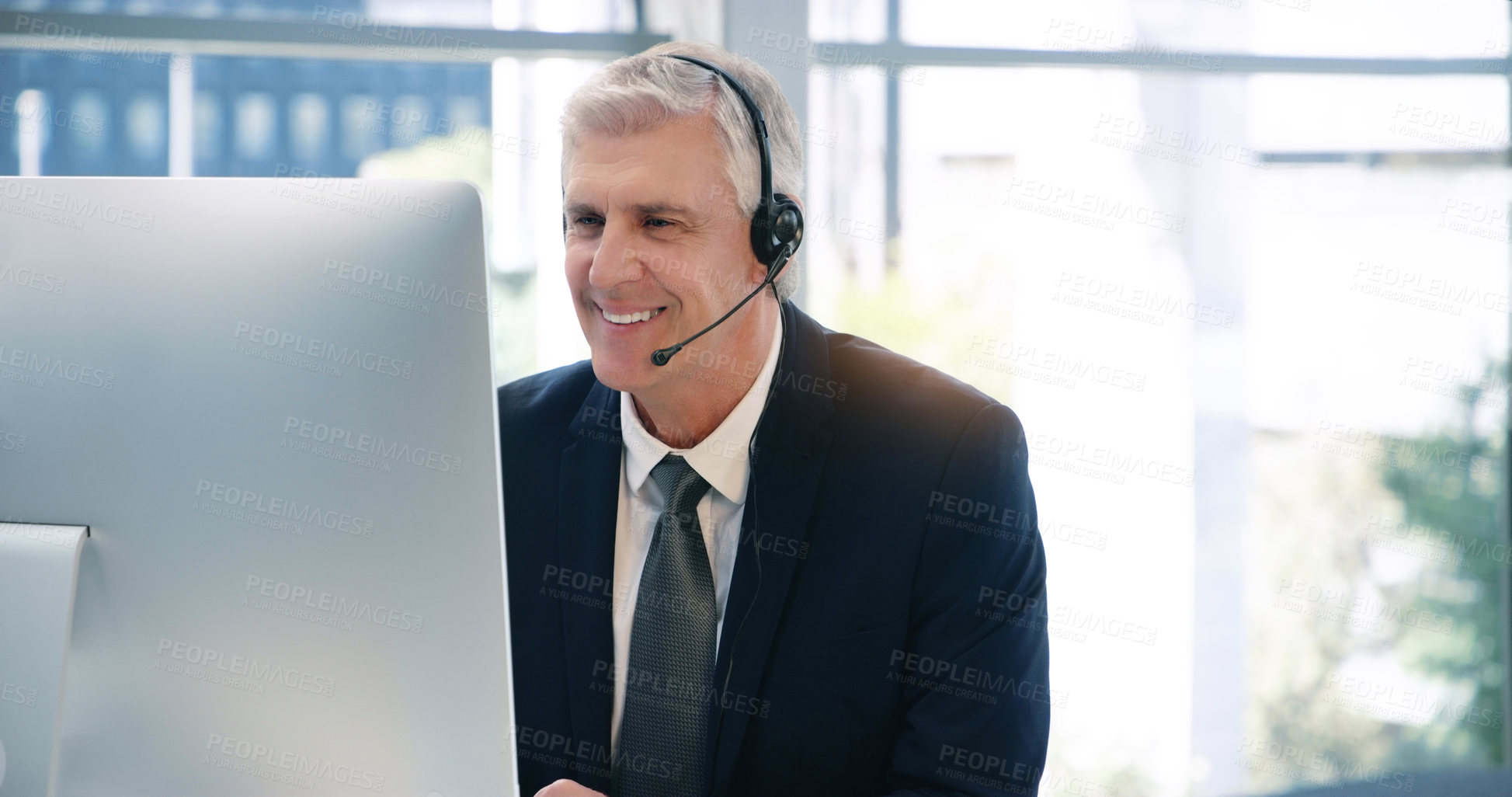 Buy stock photo Video call, computer and a senior business man using a headset in the office during a virtual meeting. Desktop, smile communication with a happy male manager or CEO in an online training workshop