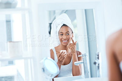 Buy stock photo Face cream, happy woman and mirror for skincare in house bathroom for foundation, glow or natural shine. Facial lotion, model or female person with cosmetics, towel or vitamin c for beauty results