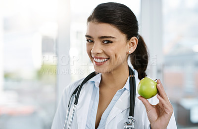 Buy stock photo Doctor, portrait and happy woman with apple for nutrition, healthy diet or wellness. Face, nutritionist or medical professional with fruit for advice, healthcare or natural food for vegan benefits