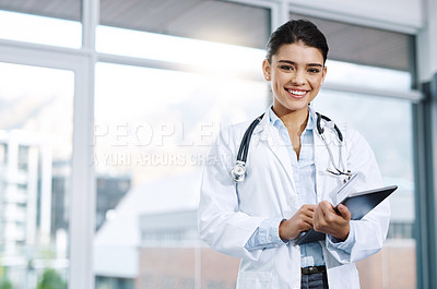 Buy stock photo Portrait, doctor and happy woman with tablet in hospital for research, telehealth or healthcare. Face, smile and female medical professional with touchscreen tech for online wellness in clinic.